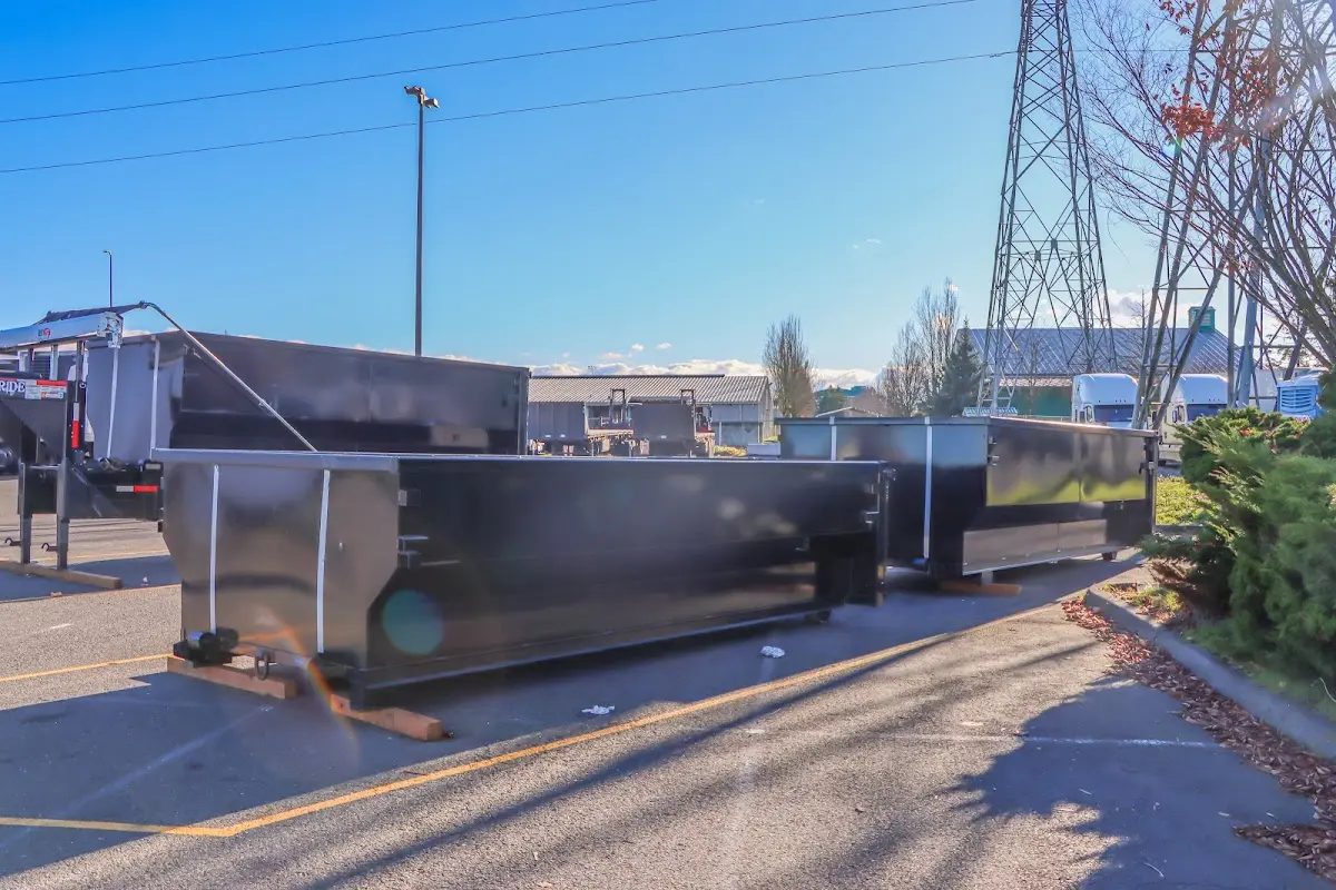 Roll-off dumpster ready for waste disposal at job site for 30 Yard Dumpster Rental in Fletcher